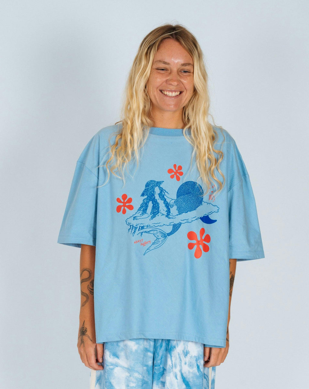 Cloud Surfing by Easty Beasty in Baby Blue - Artist Collaboration Tee